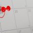 close up of a red pushpin marking the 19th on a ca 2026 03 25 23 38 23 utc 1